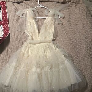 Elegant Cream Dress with Tulle Overlay and pearl accents